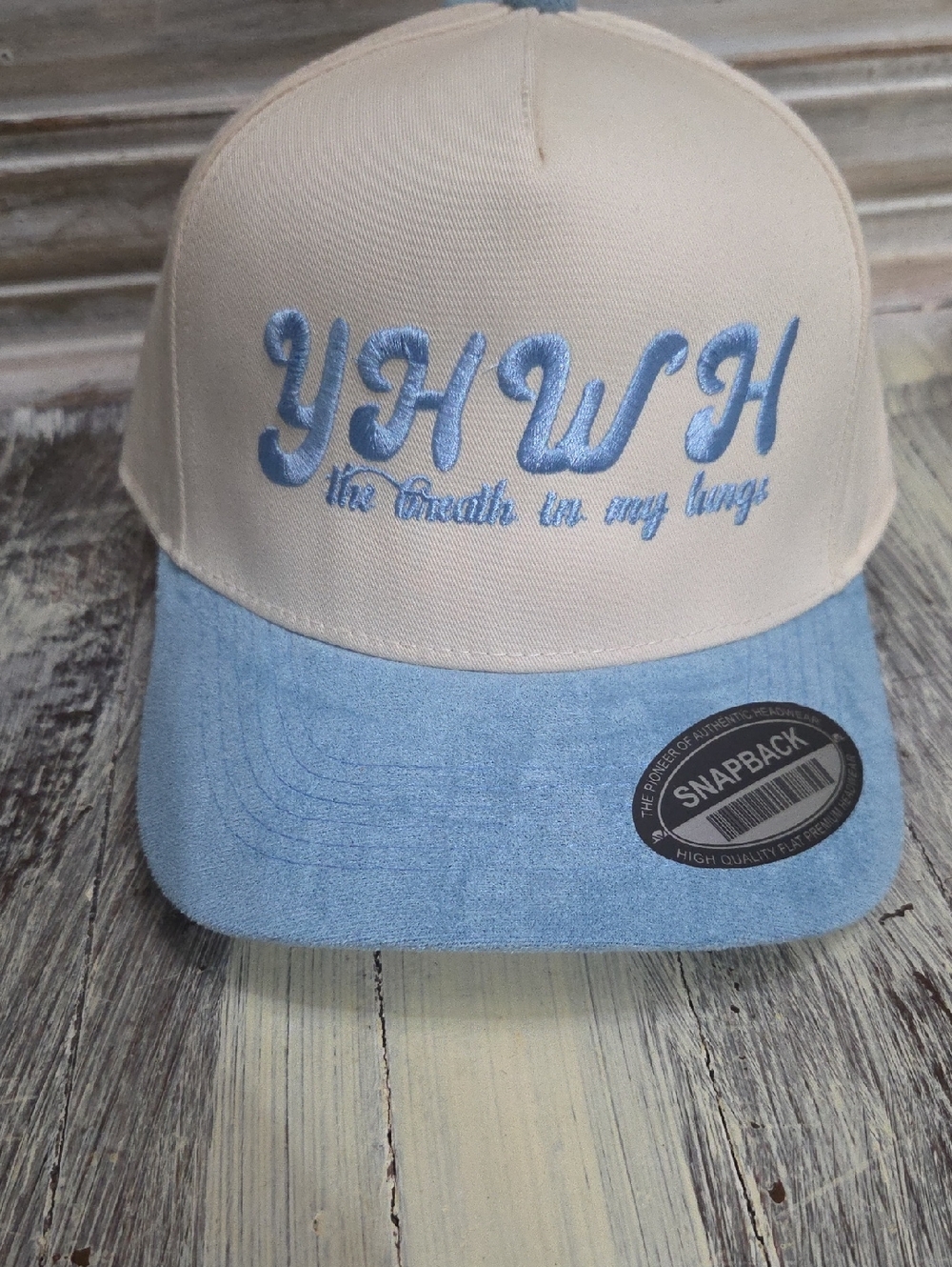 YHWH Embroidered Snapback Cap in Cream and Light Blue